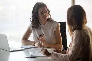 Two businesswomen talking